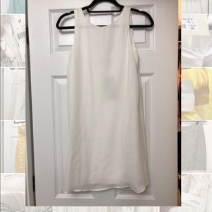 White Flowy Dress with Bow Detail in Back